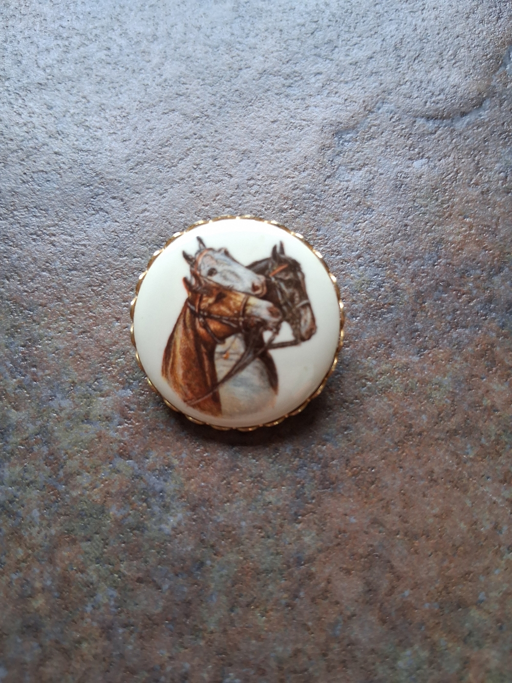 Vintage Porcelain Brooch With A Transfer Print Of Three Horses